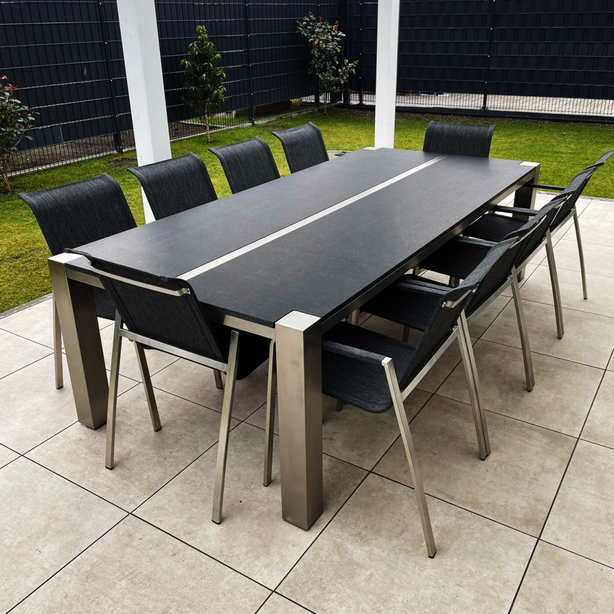 Natursteintisch mit Edelstahlgestell – Tischmanufaktur Axel Jahn